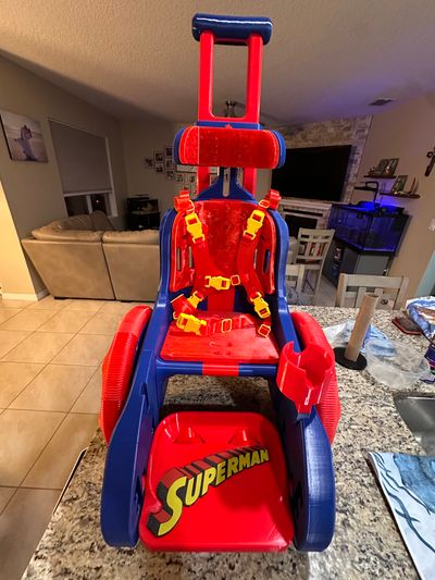 Red and blue Superman themed Toddler Mobility Trainer